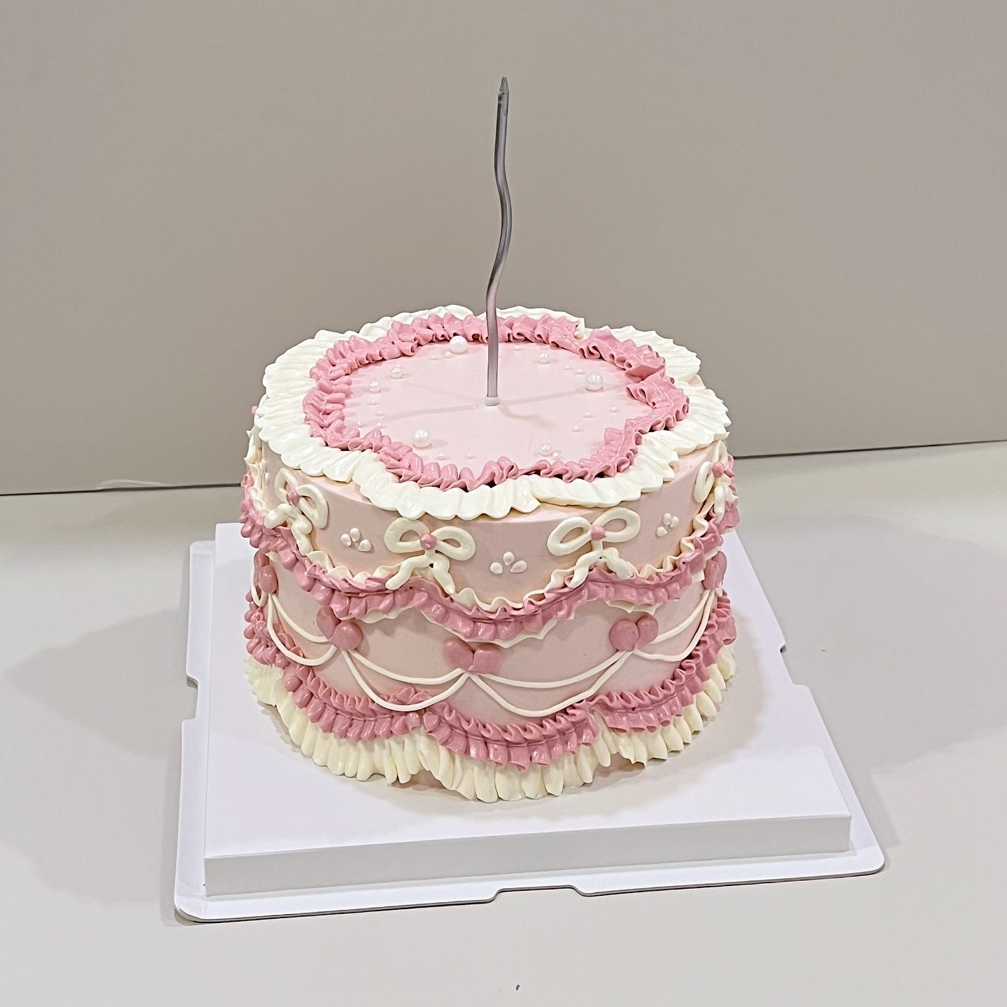 Minimalist flat-lay illustrated cake with a personalised message